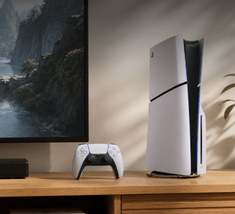 Image of a Playstation 5 gaming console and controller next to a television screen