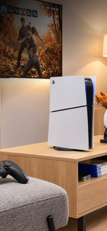 PS5 sitting on top of an entertainment center