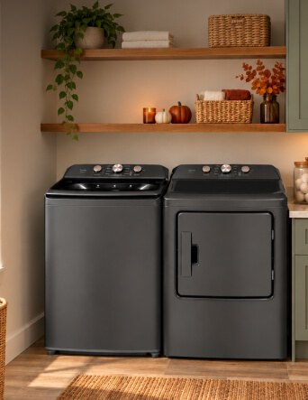 Maytag laundry pair set between two cabinets