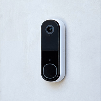 Arlo doorbell mounted next to front door