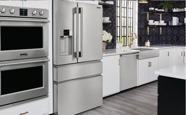Frigidaire Professional Wall Ovens for slick slider section shows wall ovens and refrigerator