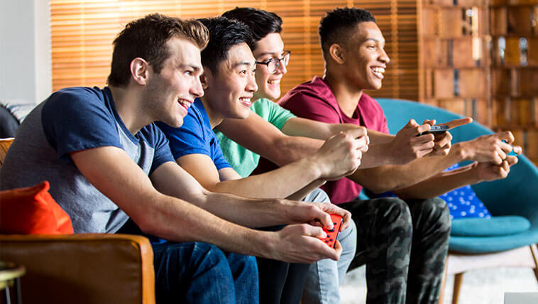 Four Friends Playing Nintendo Switch