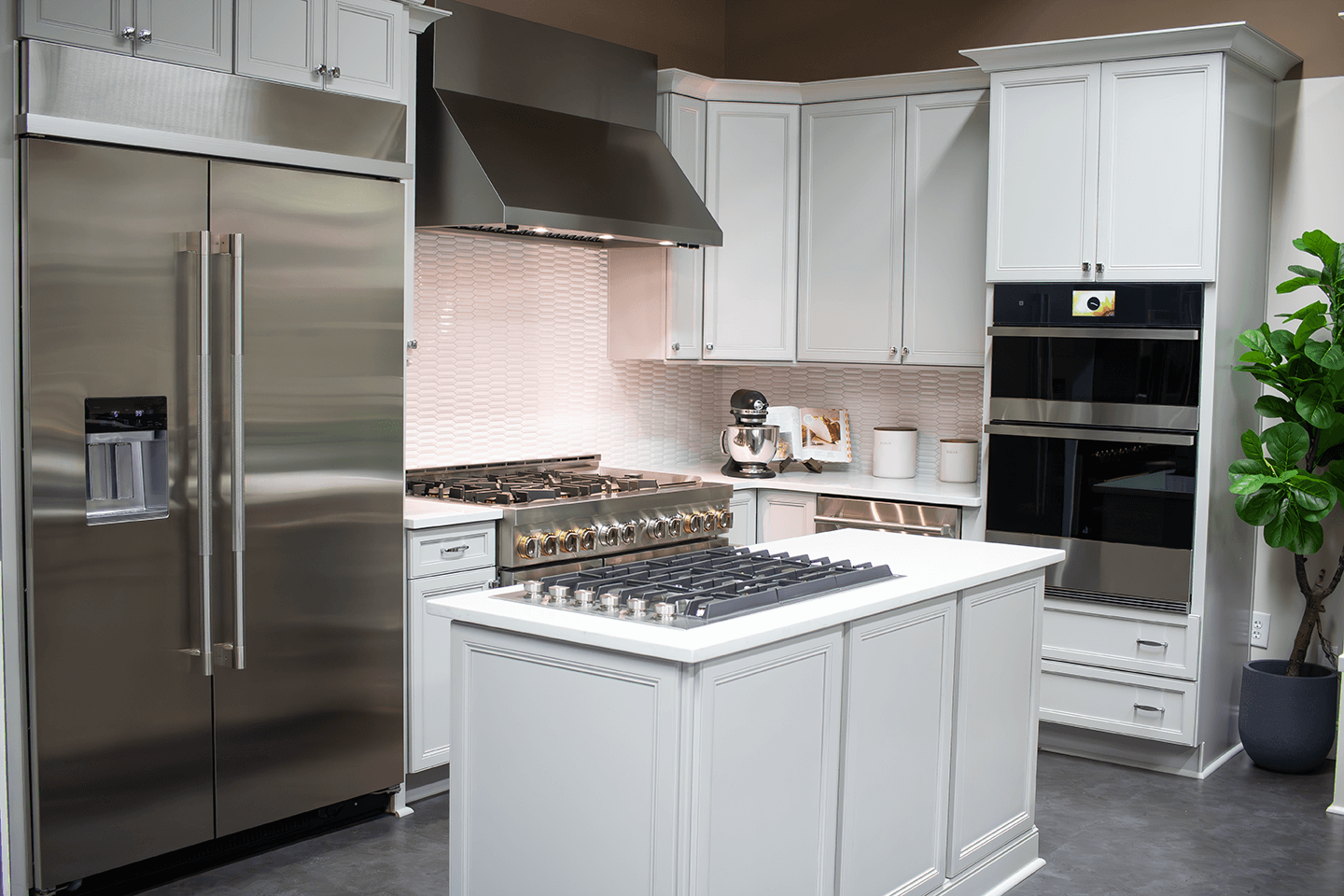 Designer Showroom Full Kitchen with Fridge, Oven, Range, Dishwasher, and Wall Ovens